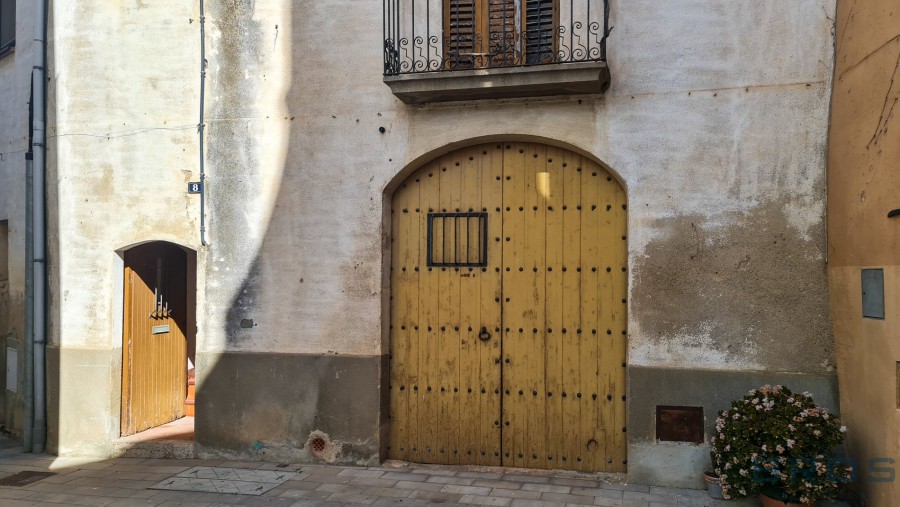 CASA DE PEDRA AMB ENCAT